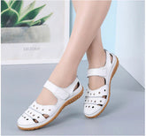 Damen-Flachleder-Sandalen mit Hohlhaken