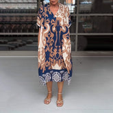 Bedrucktes V-Ausschnitt-Midikleid mit lockerer Passform